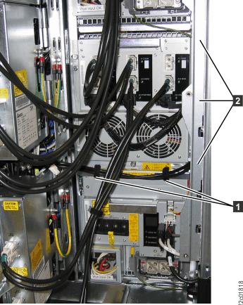 Power cables behind lower DC-UPS DSU (E2)